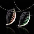 Leaf-shaped 925 necklace pendant with tropical vein inlay; silver chain