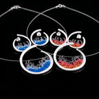 Conjunto de pendientes de aro de plata con diseños de salpicaduras de resina azul y roja