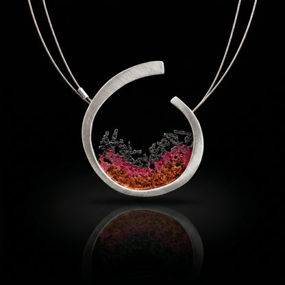 Silver 925 pendant with teardrop bezel and red-pink ocean scene