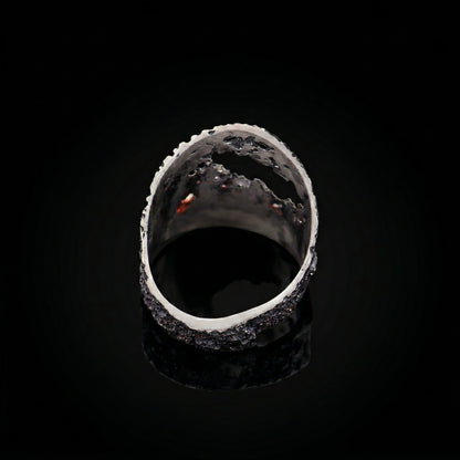 925 ring with textured silver exterior and hollow inner band