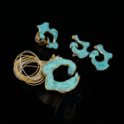 Eterna C turquoise enamel earrings with gold-tone edging, sculpted openwork pieces