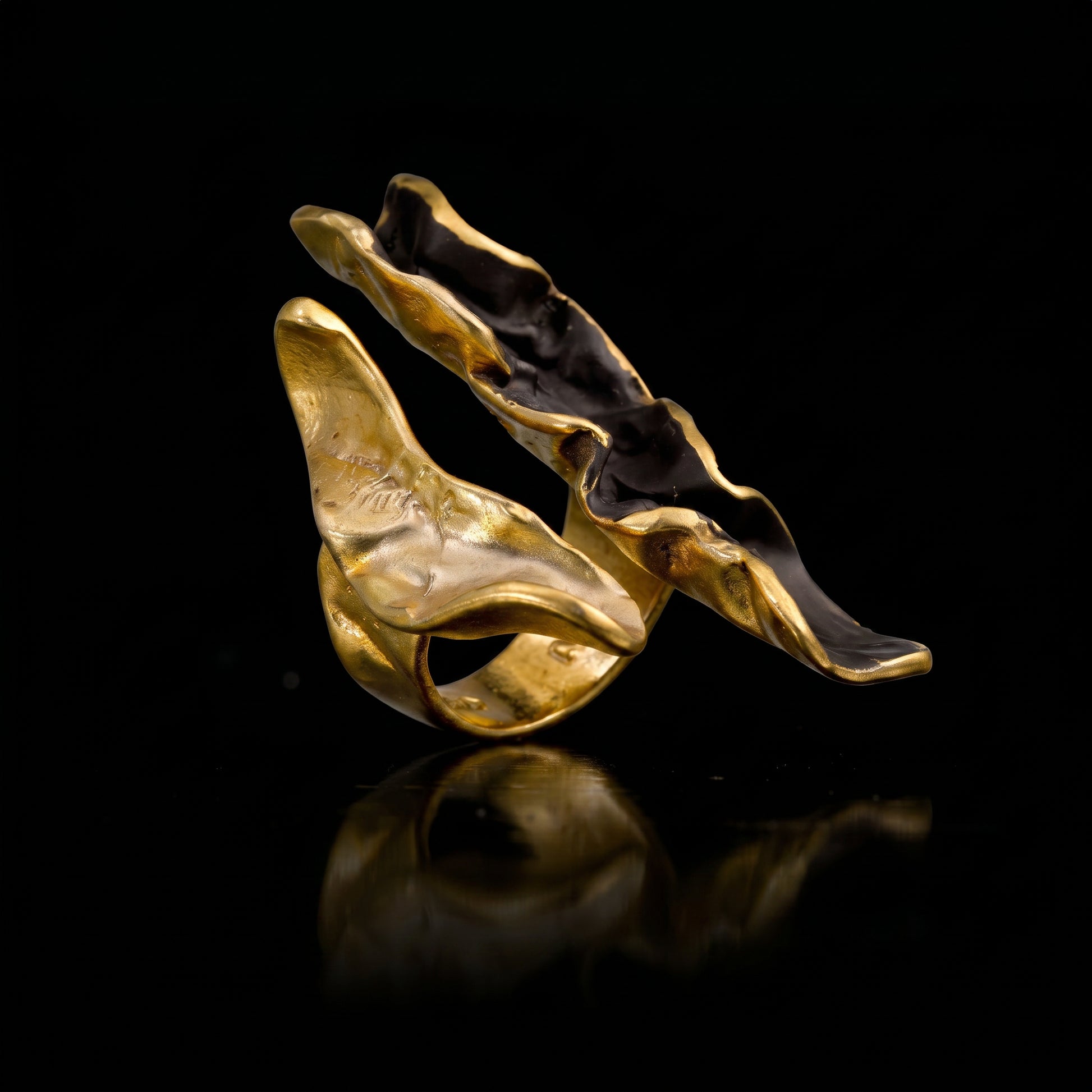 Gold-tone wave ring with dark back enamel and raised wave design