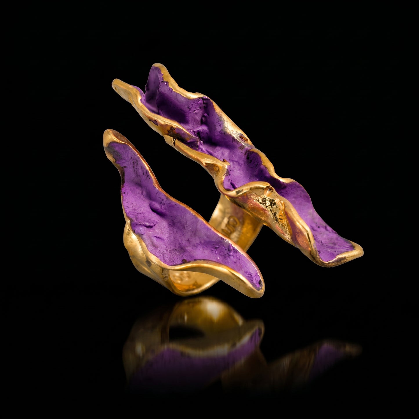 Purple wave ring with gold-tone setting and raised enamel wave details