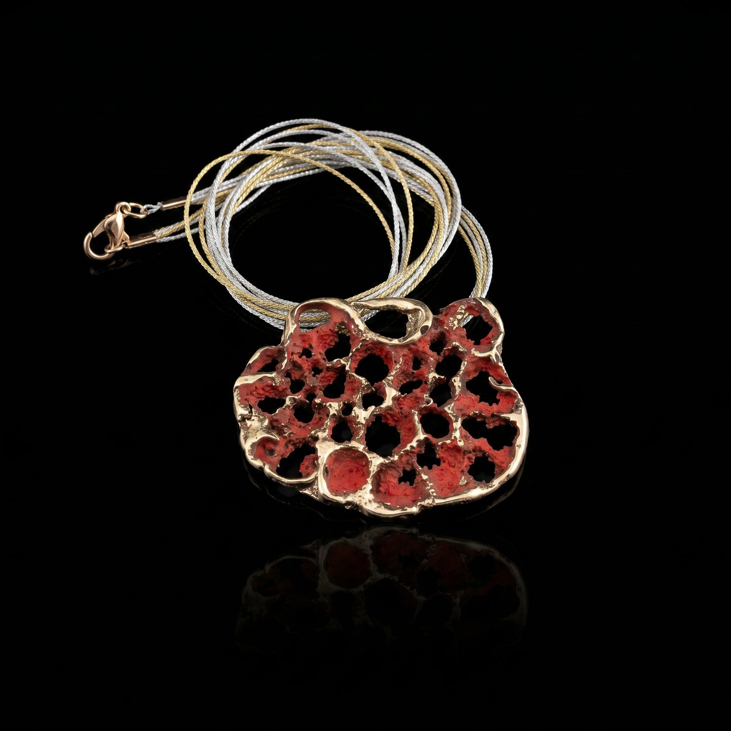 Perforata Lux pendant necklace, red perforated oval pendant with silver cord loop