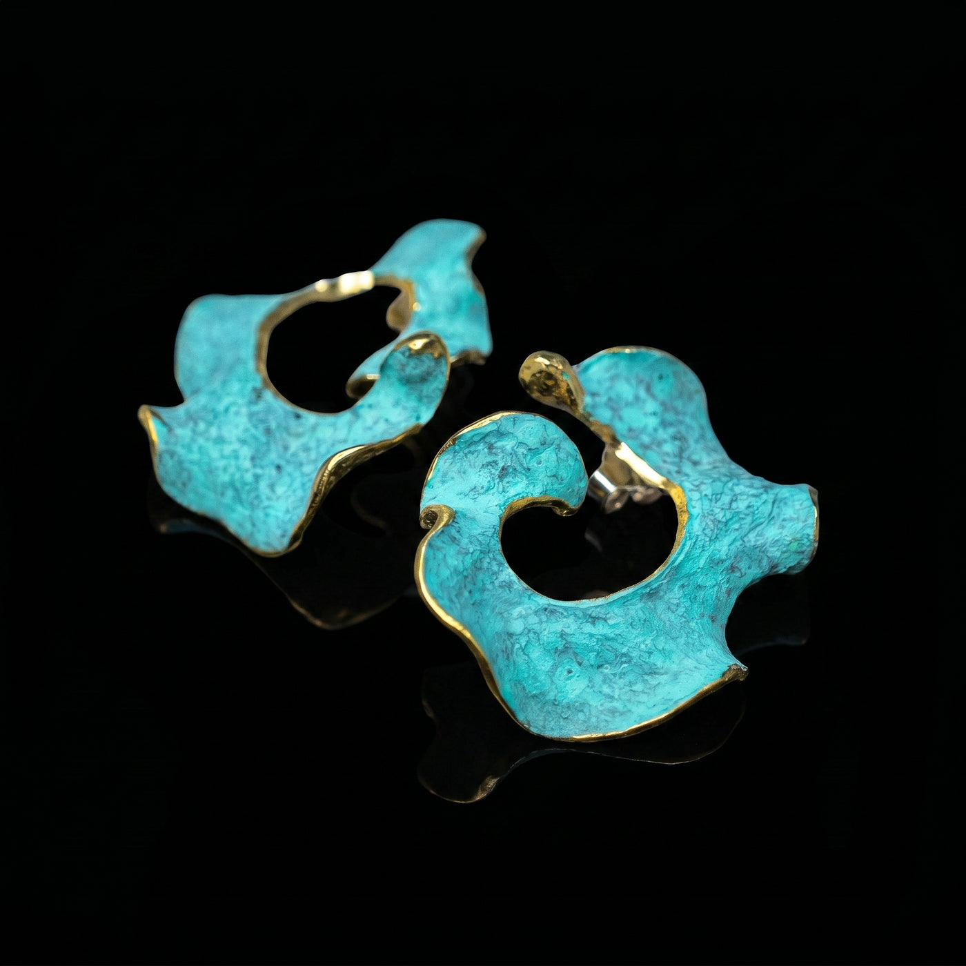 Eterna C turquoise enamel earrings with gold-tone edging, sculpted open rings