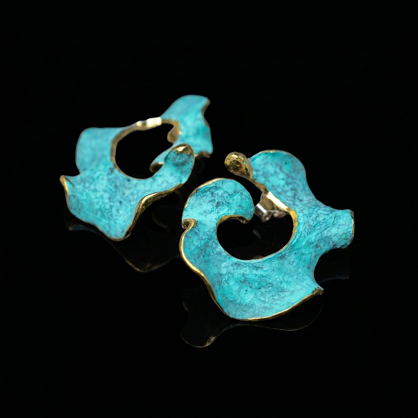 Eterna C turquoise enamel earrings with gold-tone edging, sculpted open rings