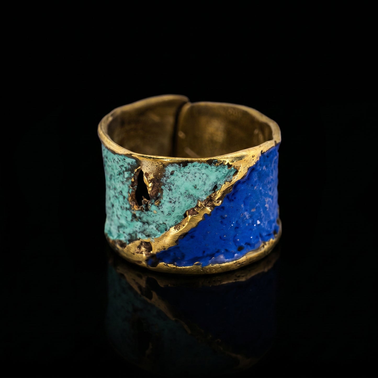 Turquoise and blue enamel ring with gold-toned edging, open-texture design