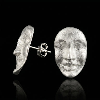 Silver face stud earrings with textured oval coin design and butterfly backs