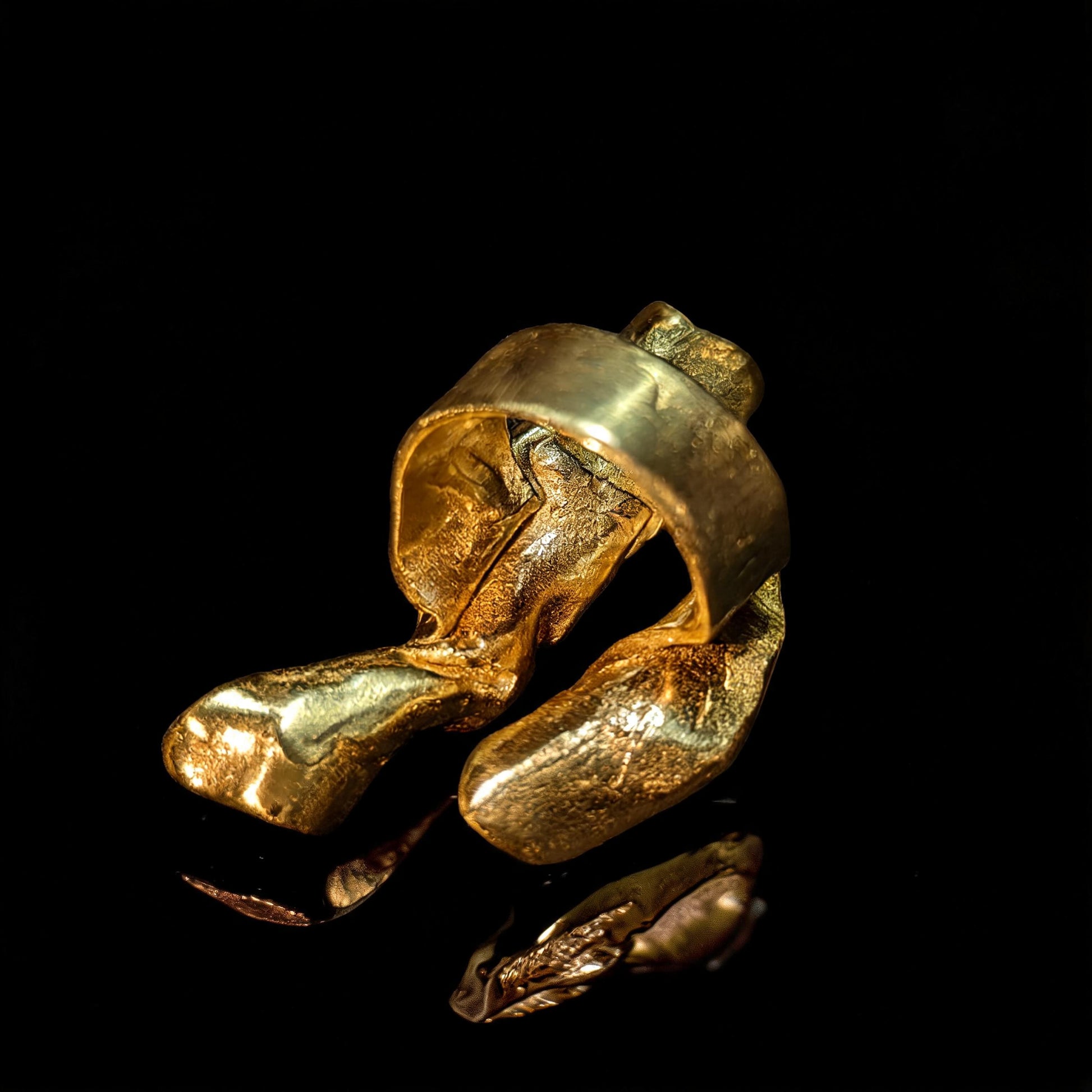 18K gold wave ring angled view, wide sculpted textured band