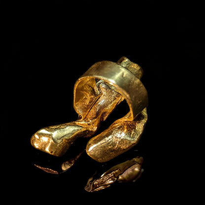 18K gold wave ring angled view, wide sculpted textured band